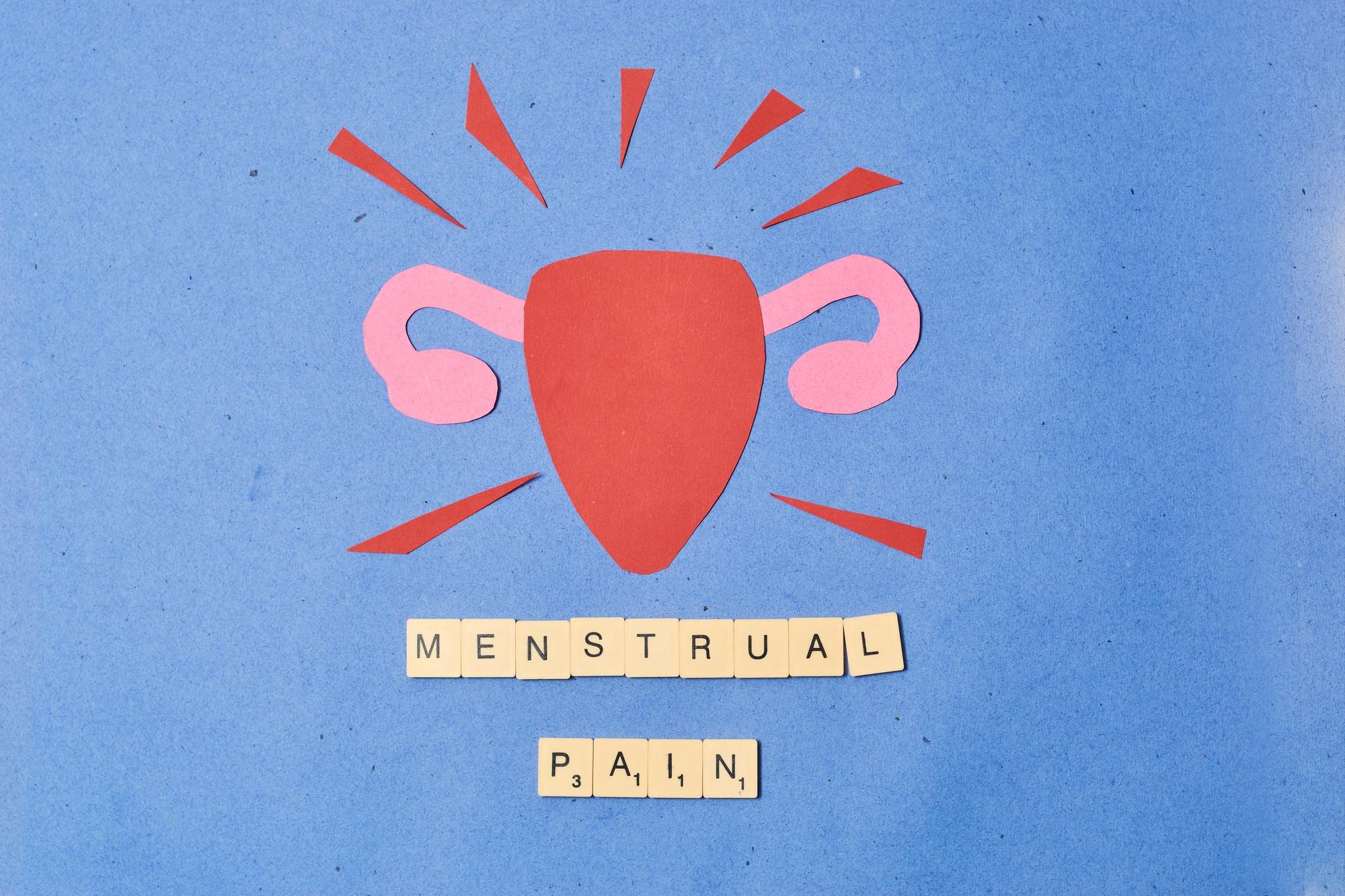 Woman's uterus in paper art. PMS concept and women's health.